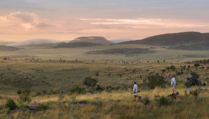 Mhondoro Safari Lodge and Villa, Luxurious bush walk with beautiful sunset